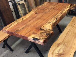 Large wooden table with polished edge, Example of Live Edge Houston Table work and design quality